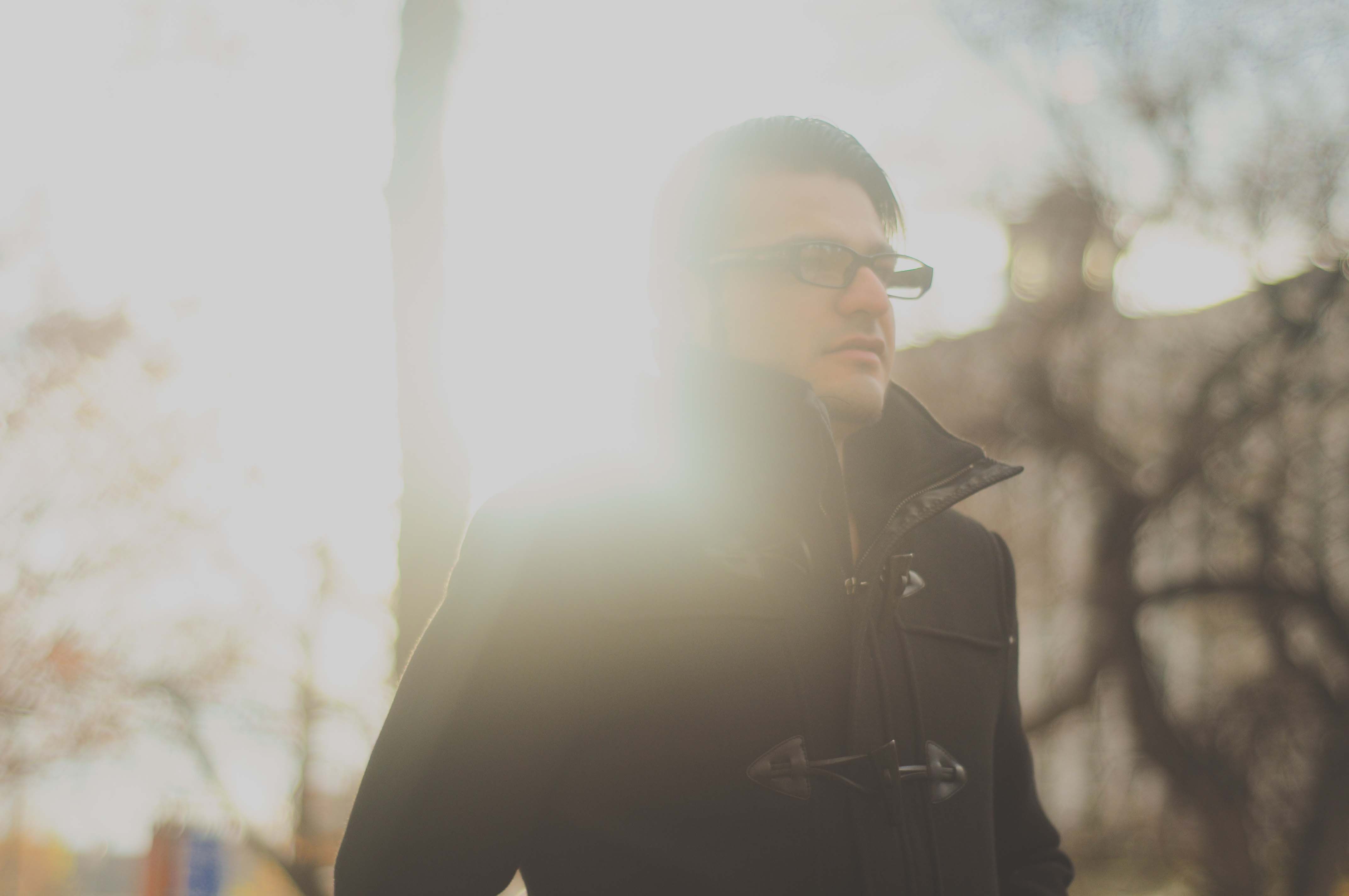 unsplash-man-sun-light-coat-scraf.jpg